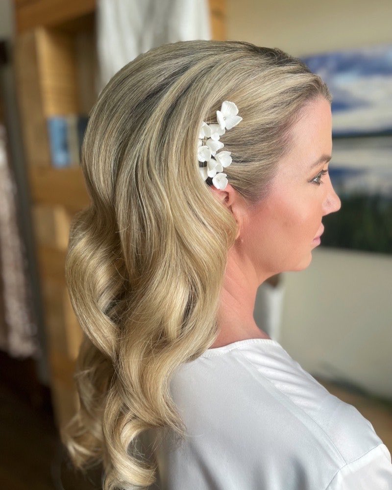 Bridal styling with a floral pin